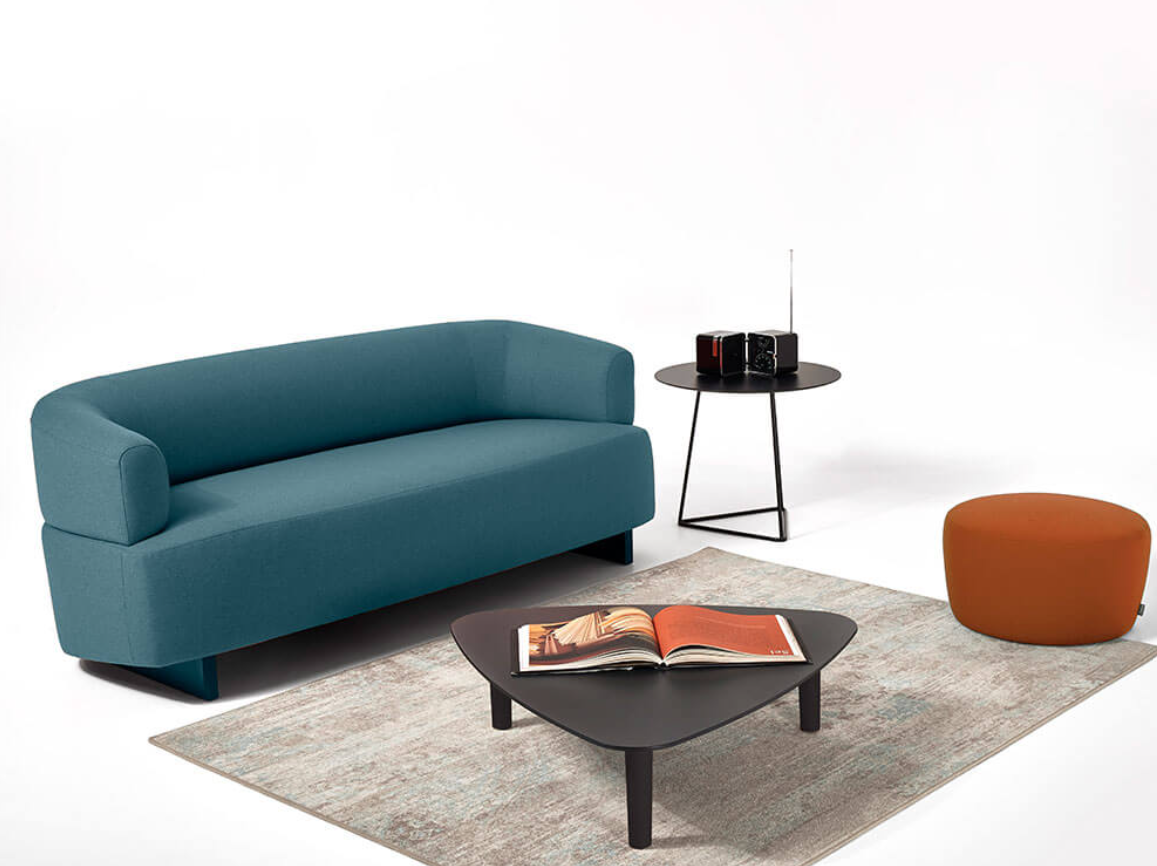 Three seater sofa with a pouffe