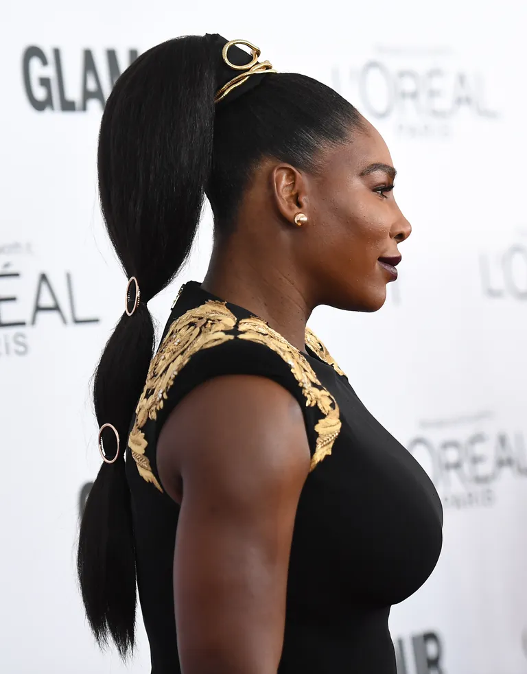 Side view of a lady rocking the bubble ponytail