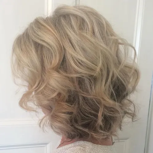 Flowy and Voluminous Curls Gorgeous Medium Length Hairstyles