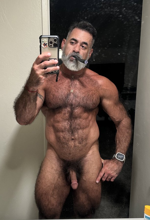 Lawson James taking an iphone mirror selfie naked smoking a cigar in the bathroom 