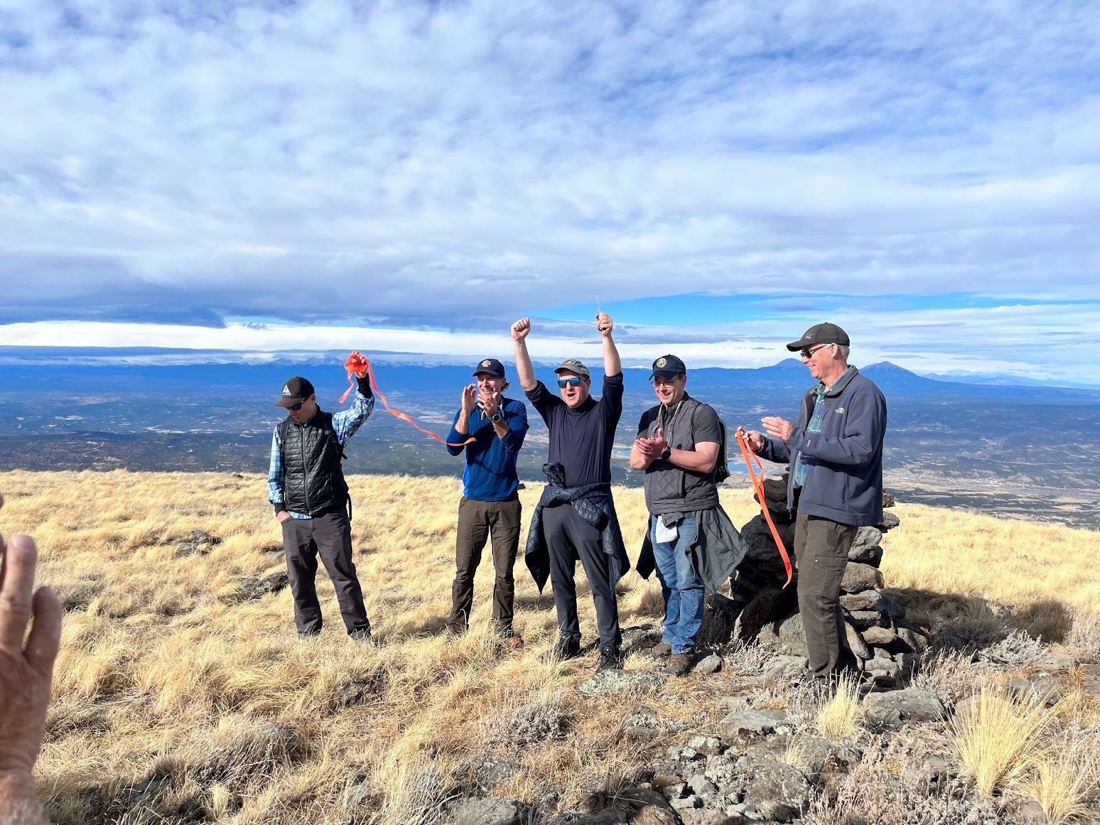 Governor Polis, Dan Gibbs, Jeff Davis, and CPW staff on Fishers Peak Summit trail.