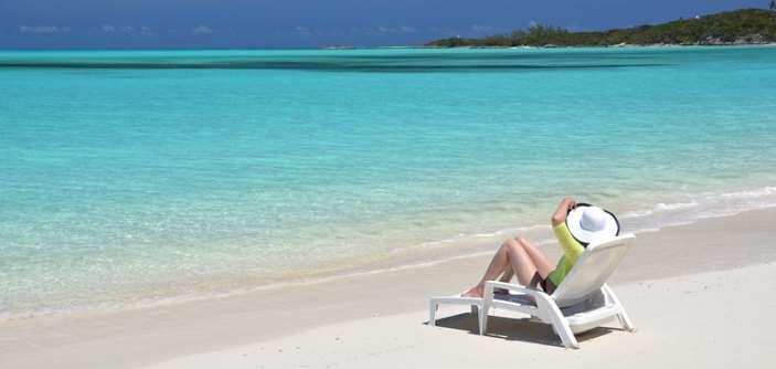 A person sitting on a beach chair