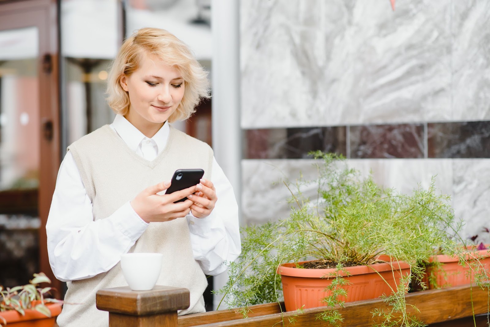 woman reading an sms message