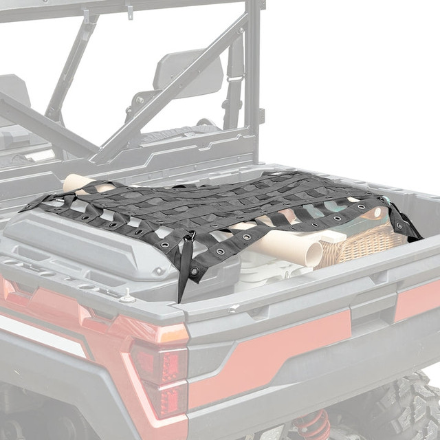An image of an ATV with Kemimoto's bed cargo net installed, securing valuables in the bed.