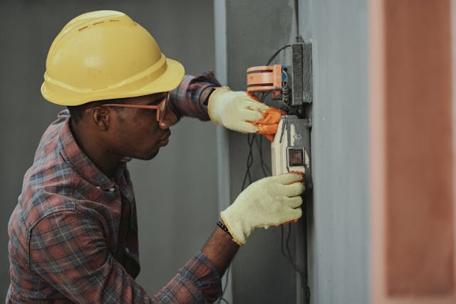 An electrician at work.