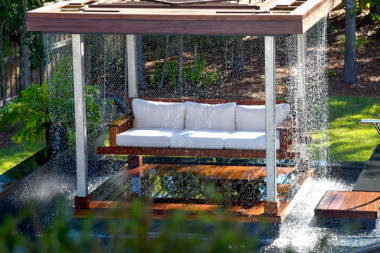 top water features to install for your outdoor living space rain curtain with seating custom built michigan