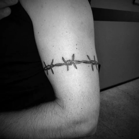 Barbed Wire Wraparound Tattoo