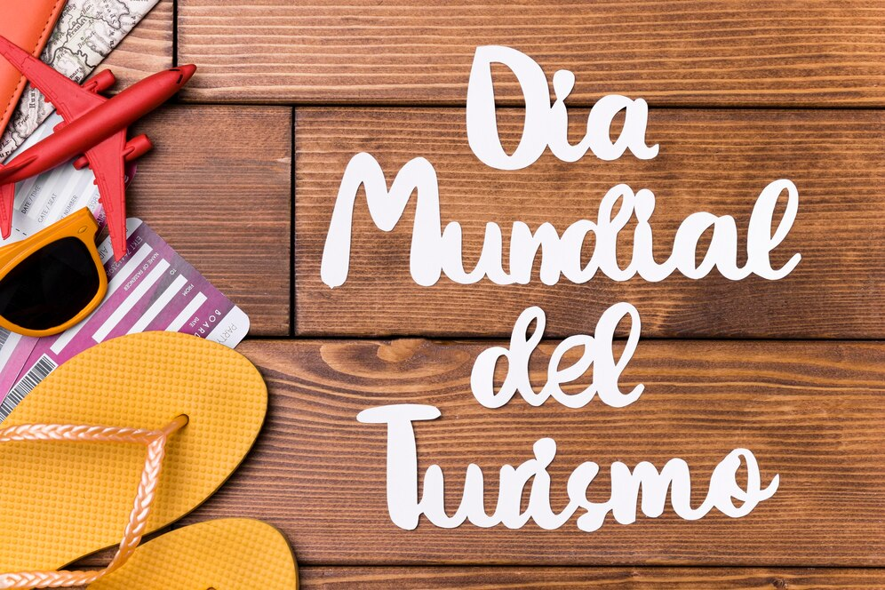 Beach Slippers and Sunglasses with the words "Día Mundial del Turismo"