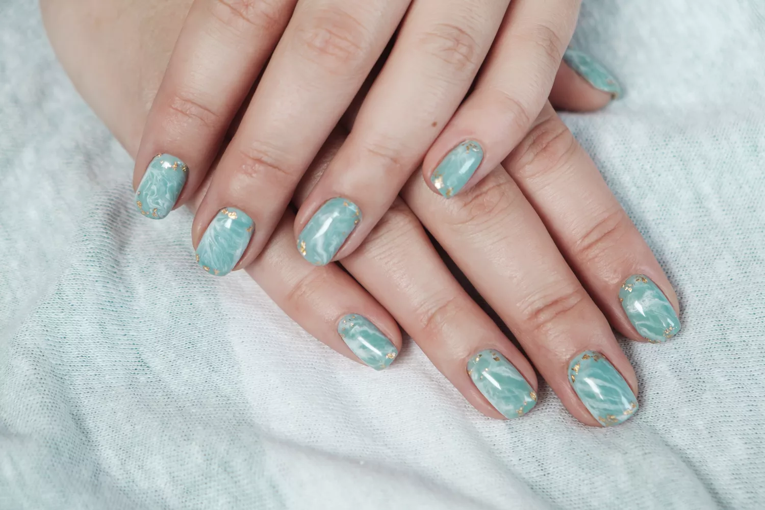 Picture showing  sage marble nail  with accents