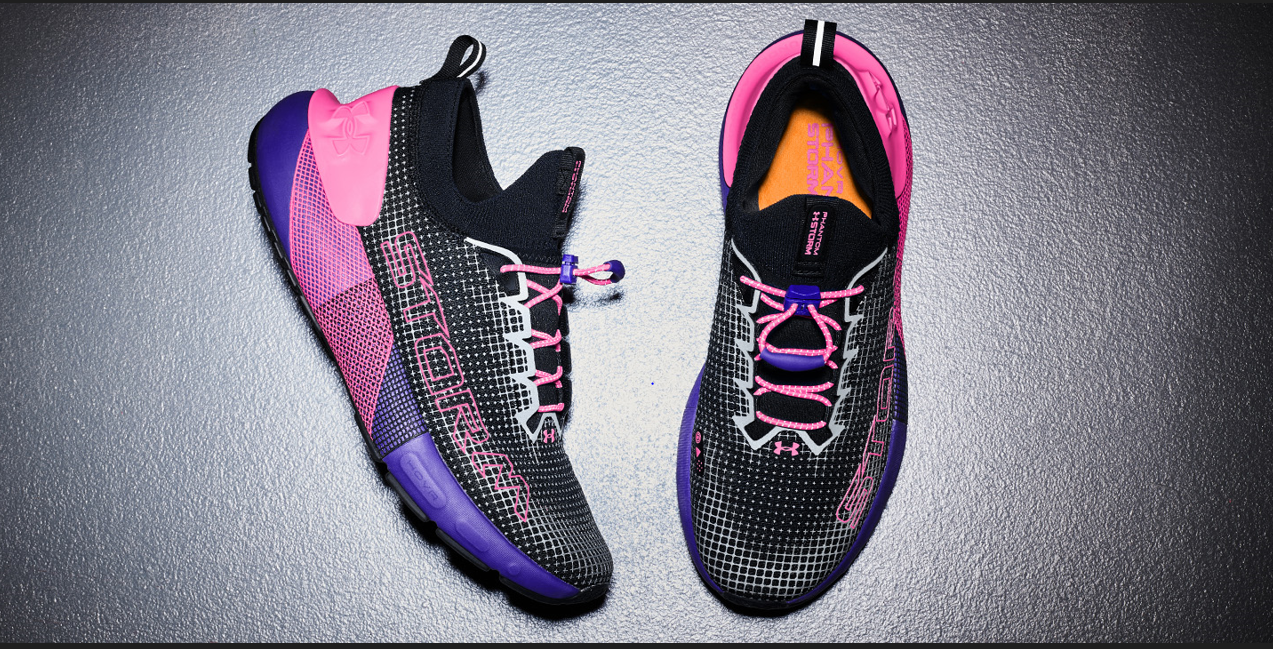 A pair of black and pink shoes

Description automatically generated