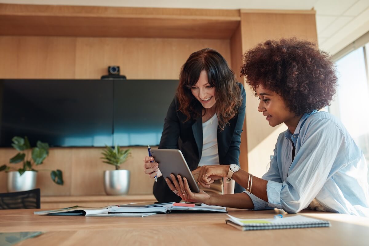 Employees using a tablet