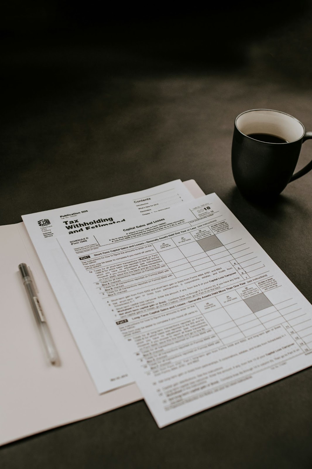 Tax form, photo by Kelly Sikkema on Unsplash