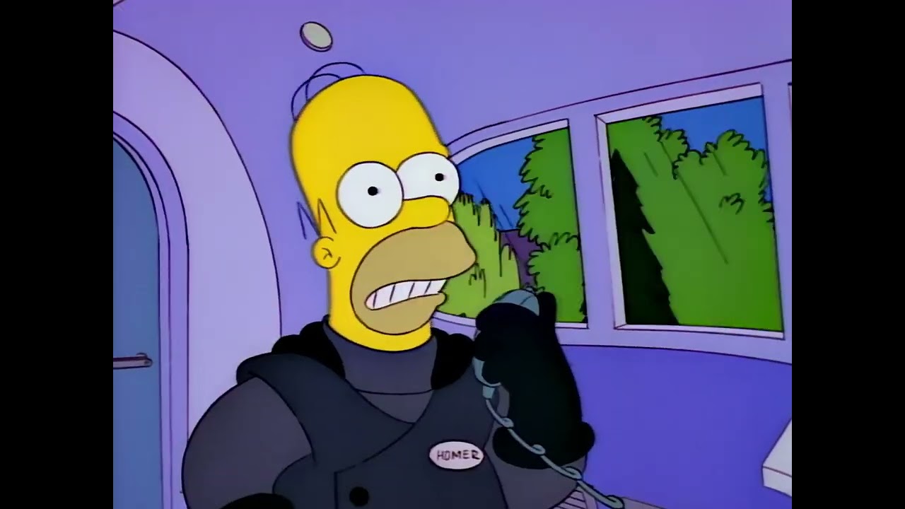 Homero nervioso hablando con Marge a través de la radio del monorriel