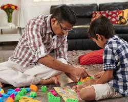 child with ADHD playing with building blocks