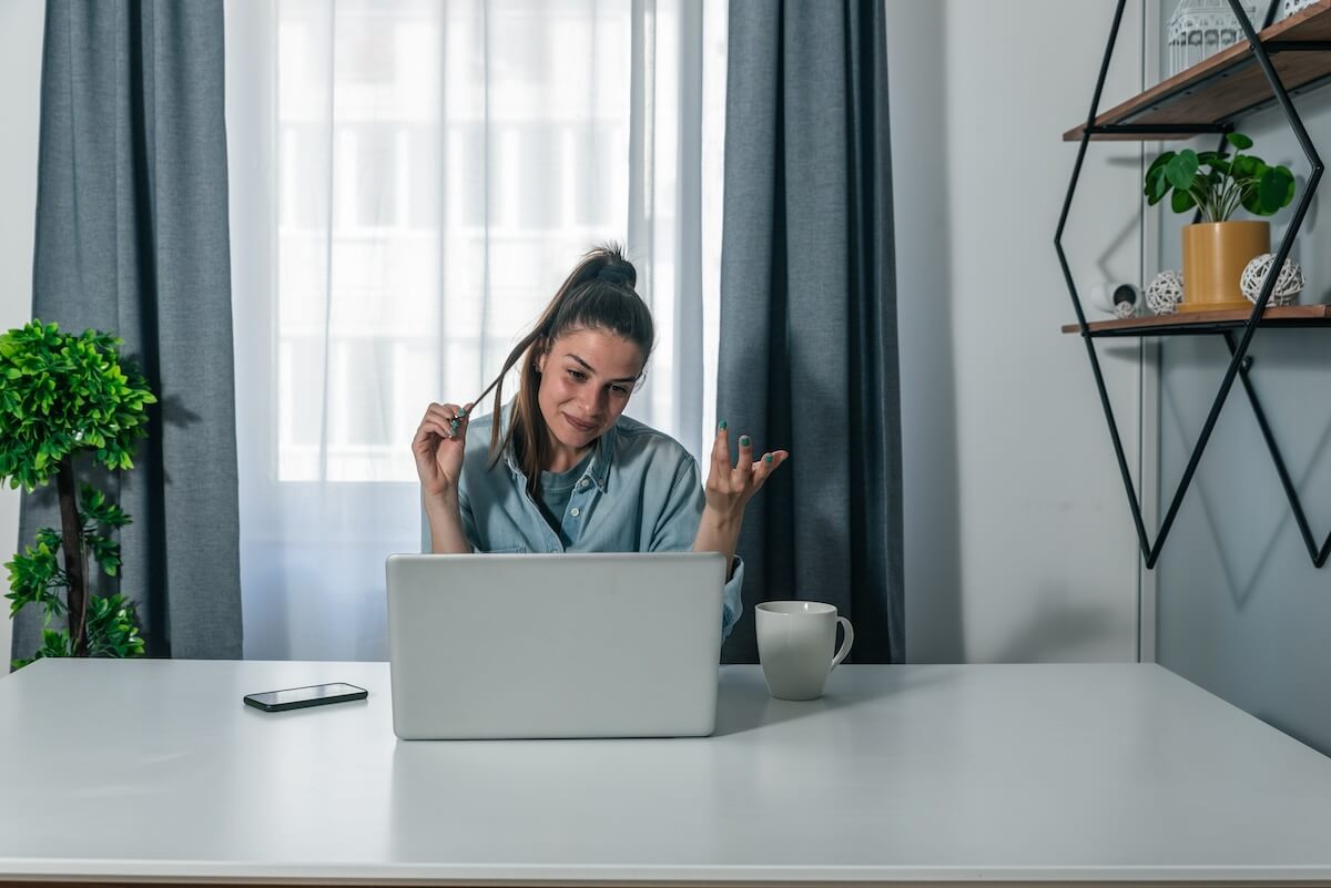 Improving patient experience: patient using her laptop for a video call