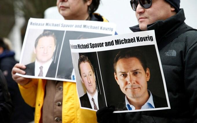 Protestors calling for China to release Canadian detainees Michael Spavor and Michael Kovrig in 2019