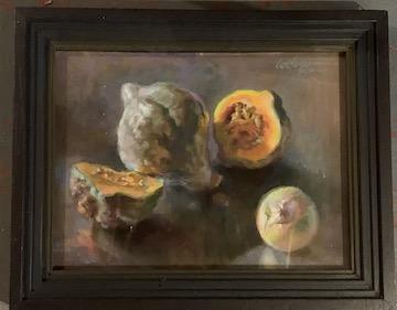 A painting of fruit in a frame

Description automatically generated