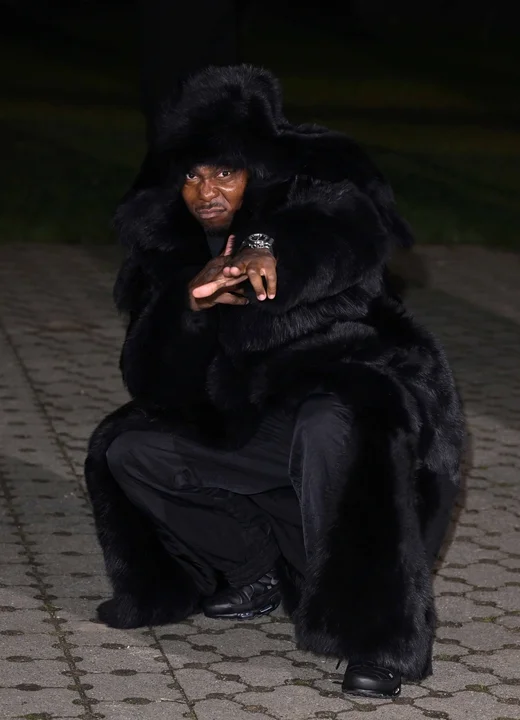 Picture showing a Star rocking a Faux fur coat for the event