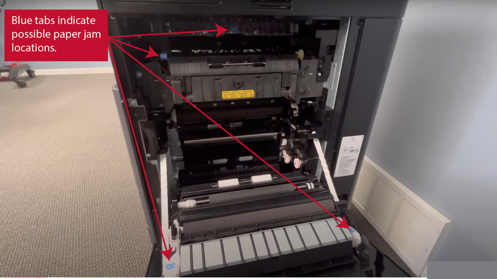Blue tabs indicate possible paper jam locations