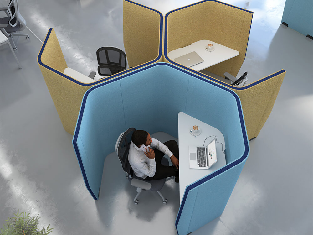 Single seating office pods with employee sitting