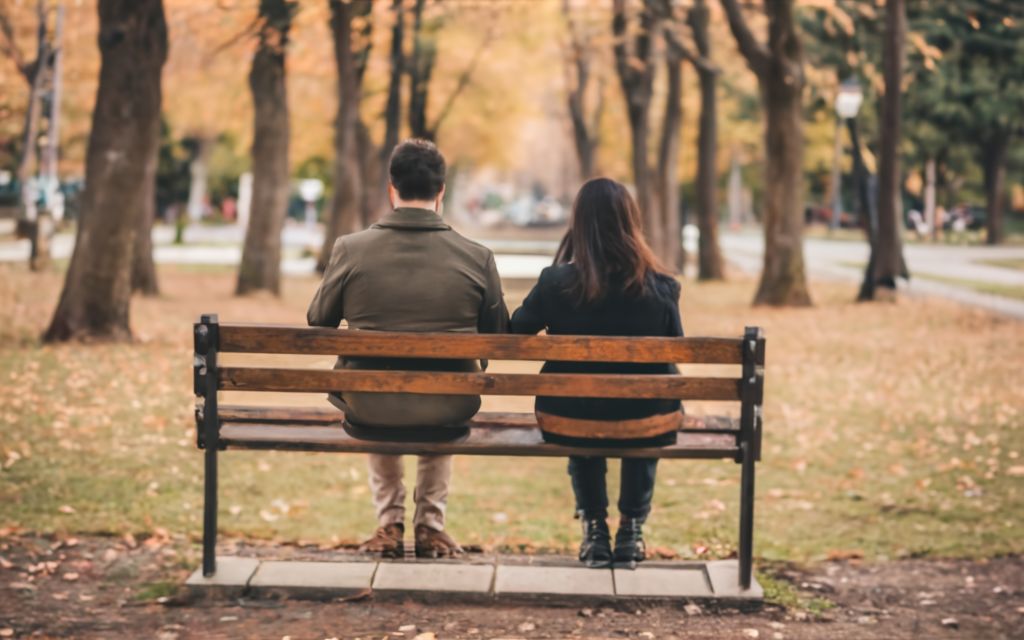 Man and woman sitting together