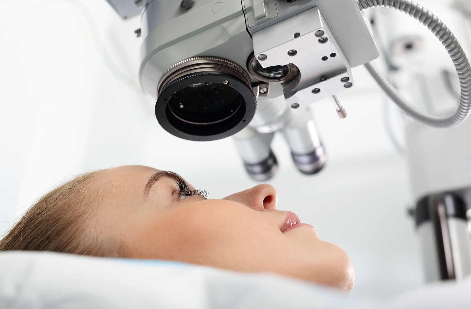 A female patient prepares for laser eye surgery