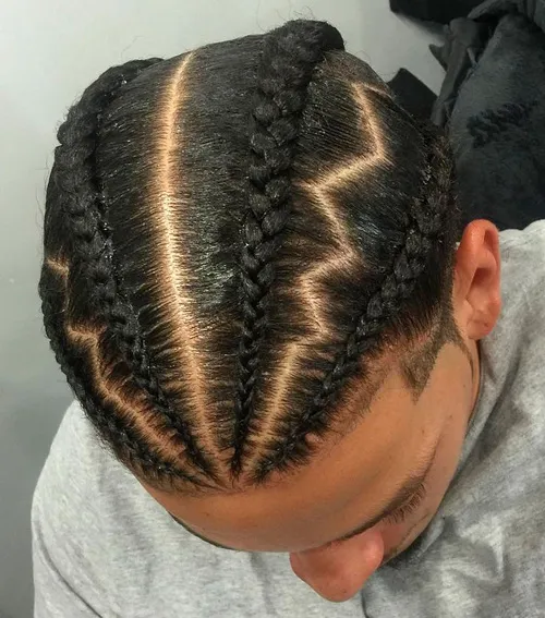 Picture showing a guy rocking the zig zag braids