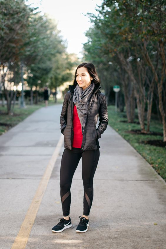 Picture of a lady layering her look with a leather jackets  for that chic soccer mom outfits