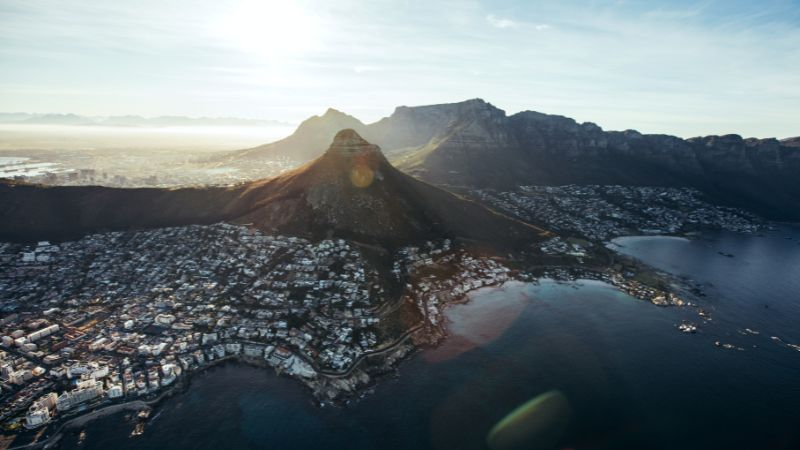 Aerial view of Devil's Peak in Cape Town, overlooking the surrounding city and coastline.