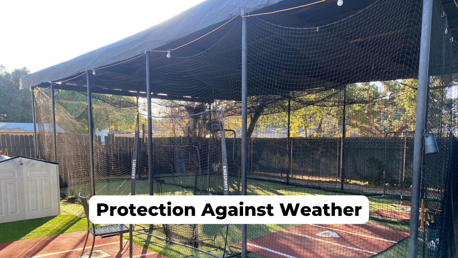 An image of backyard batting cage with sunshade installed