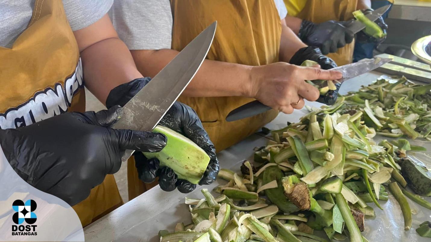 A group of people cutting vegetables

Description automatically generated