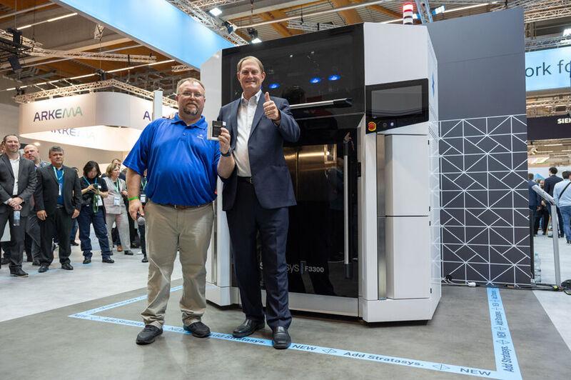Dallas Martin, Additive Application Engineer, Toyota (left) and Scott Crump, Chief Innovation Officer, Stratasys, alongside the new Stratasys F3300 unveiled today at Formnext tradeshow for Additive Manufacturing, Germany.