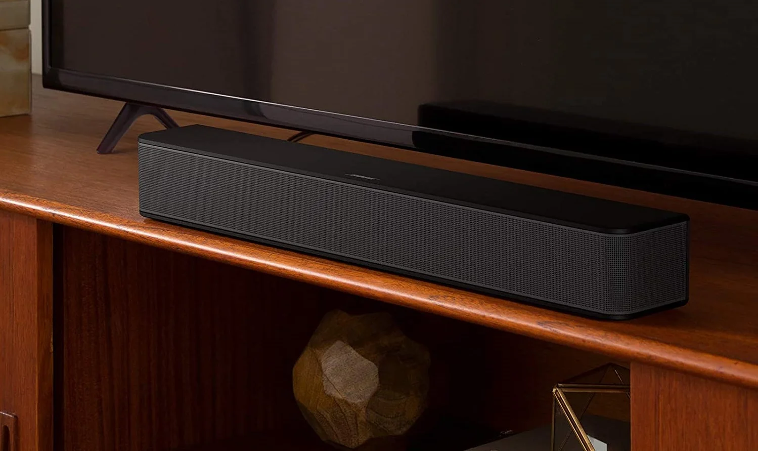 Bose Solo Soundbar Series II placed on a wooden table.