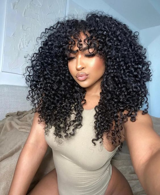 Picture showing a lady rocking the gorgeous curly hair