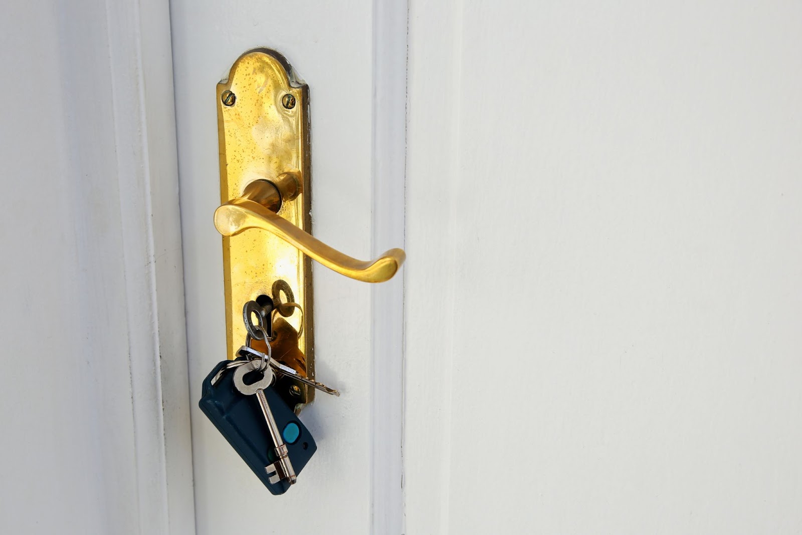 Golden door lock with keys
