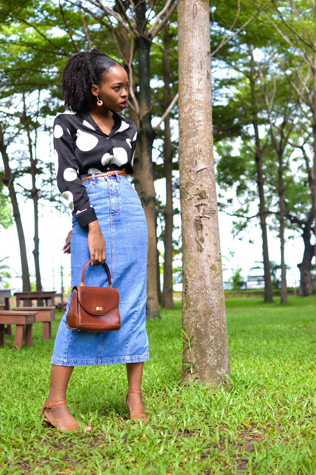 Lady rocks silk shirts  and jean skirts