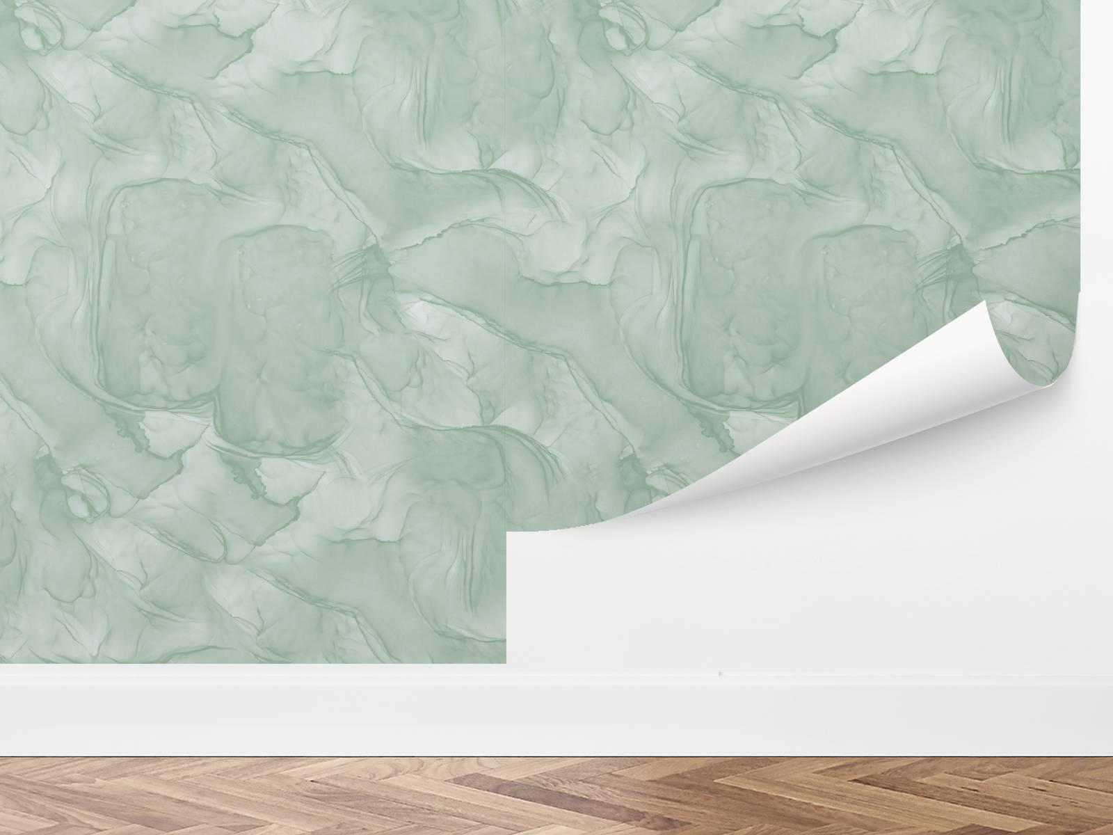 a sage green textured wallpaper