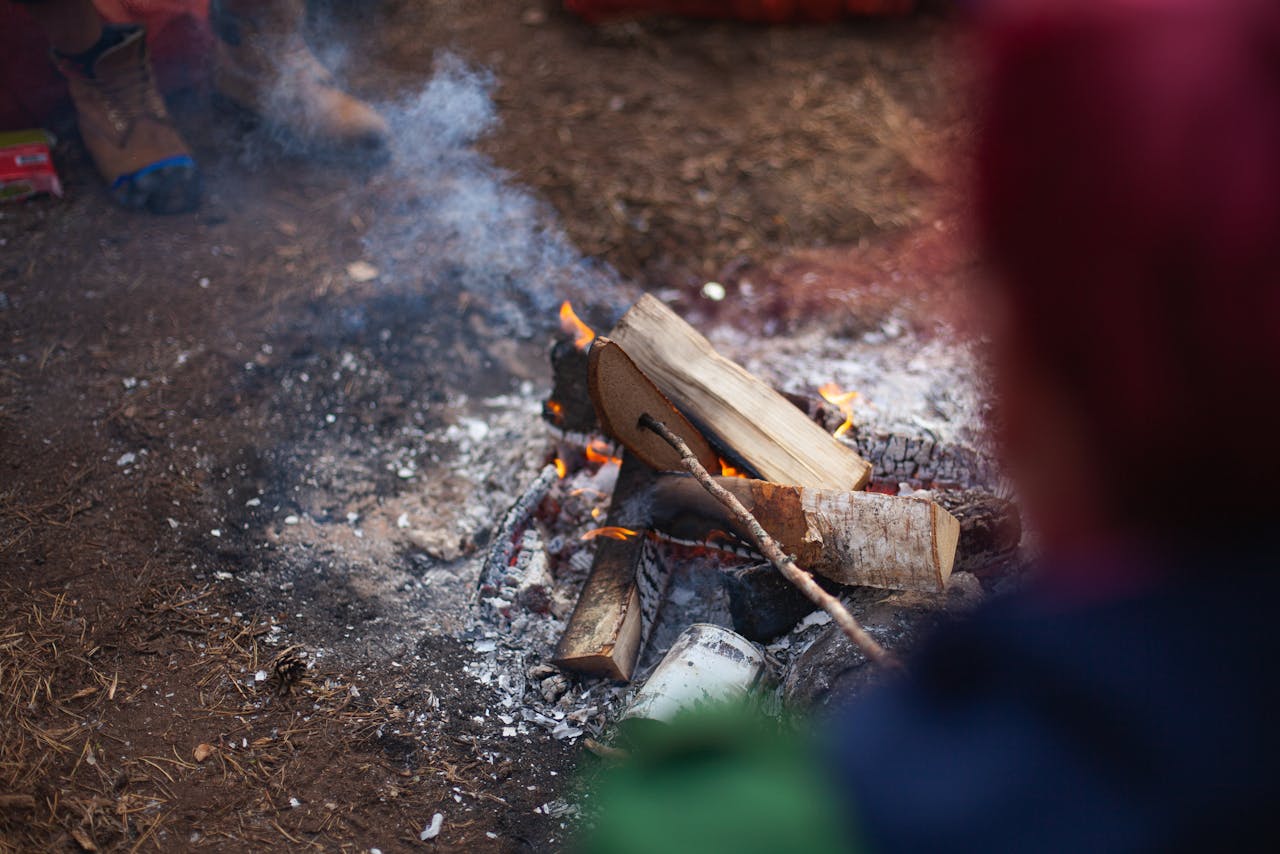 Campfire fire set-up is one of the top quarantine photoshoot ideas you can try at your home.