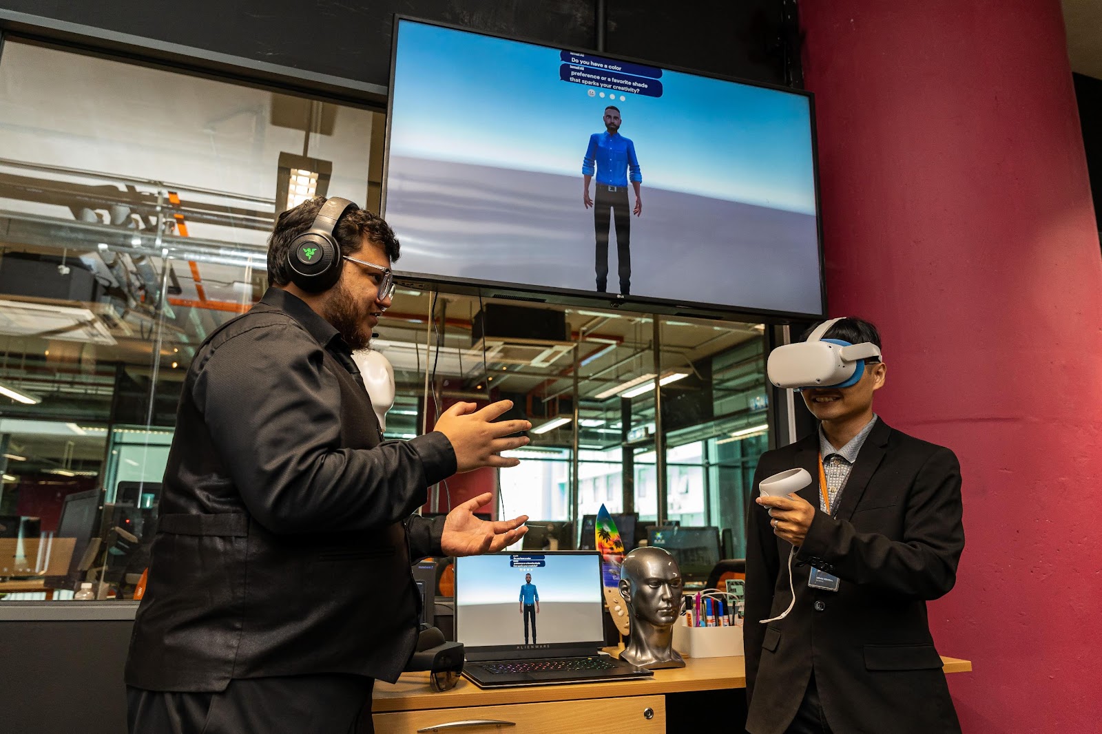 Two men wearing virtual reality goggles

Description automatically generated