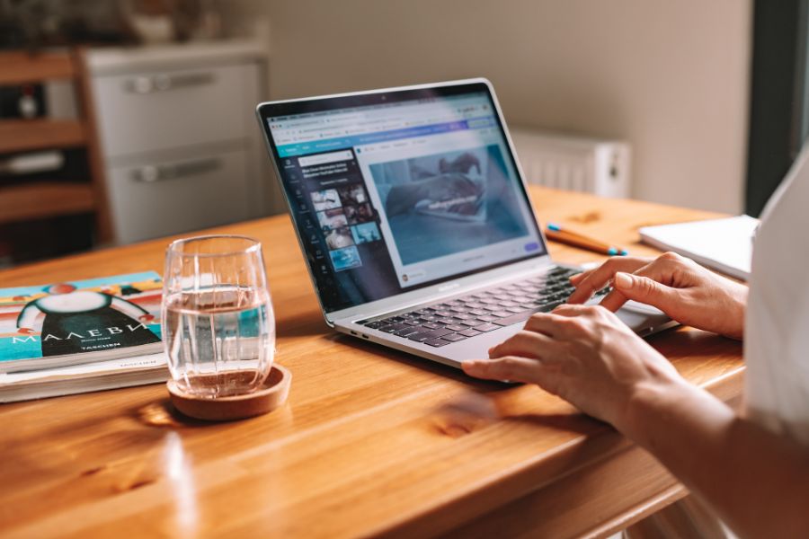 A person typing on a computer