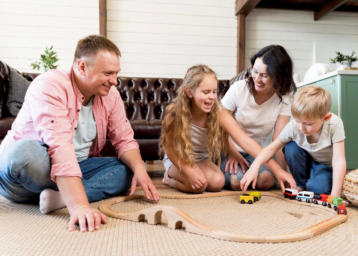 C:\Users\DELL\Downloads\full-shot-family-playing-with-train.jpg
