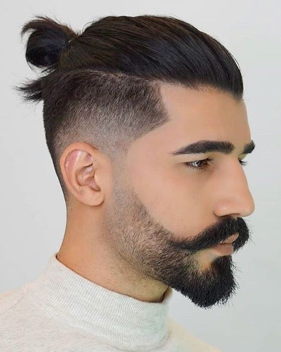 Cool haircuts: Picture of a guy rocking the man bun