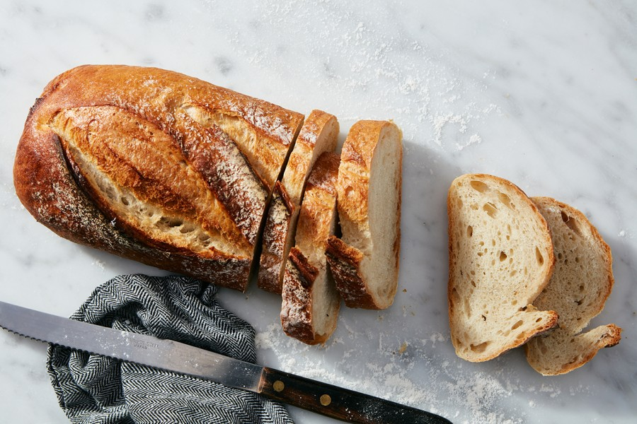 Top 10 Sourdough Starter Tips - rustic sourdough bread loaf