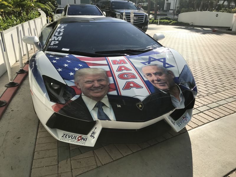 A Make America Great Again-themed Lamborghini is parked outside the Diplomat Beach Resort Dec. 7, 2019.