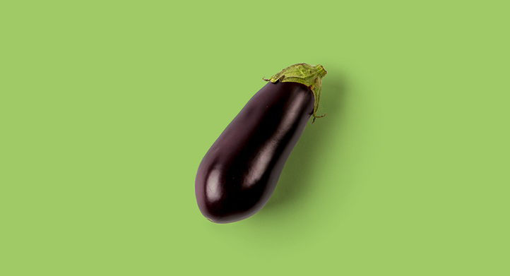 an eggplant on flat surface