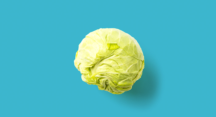 a cabbage on flat surface