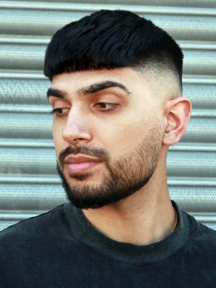 Picture showing a guy rocking the Mexican Edgar haircut style