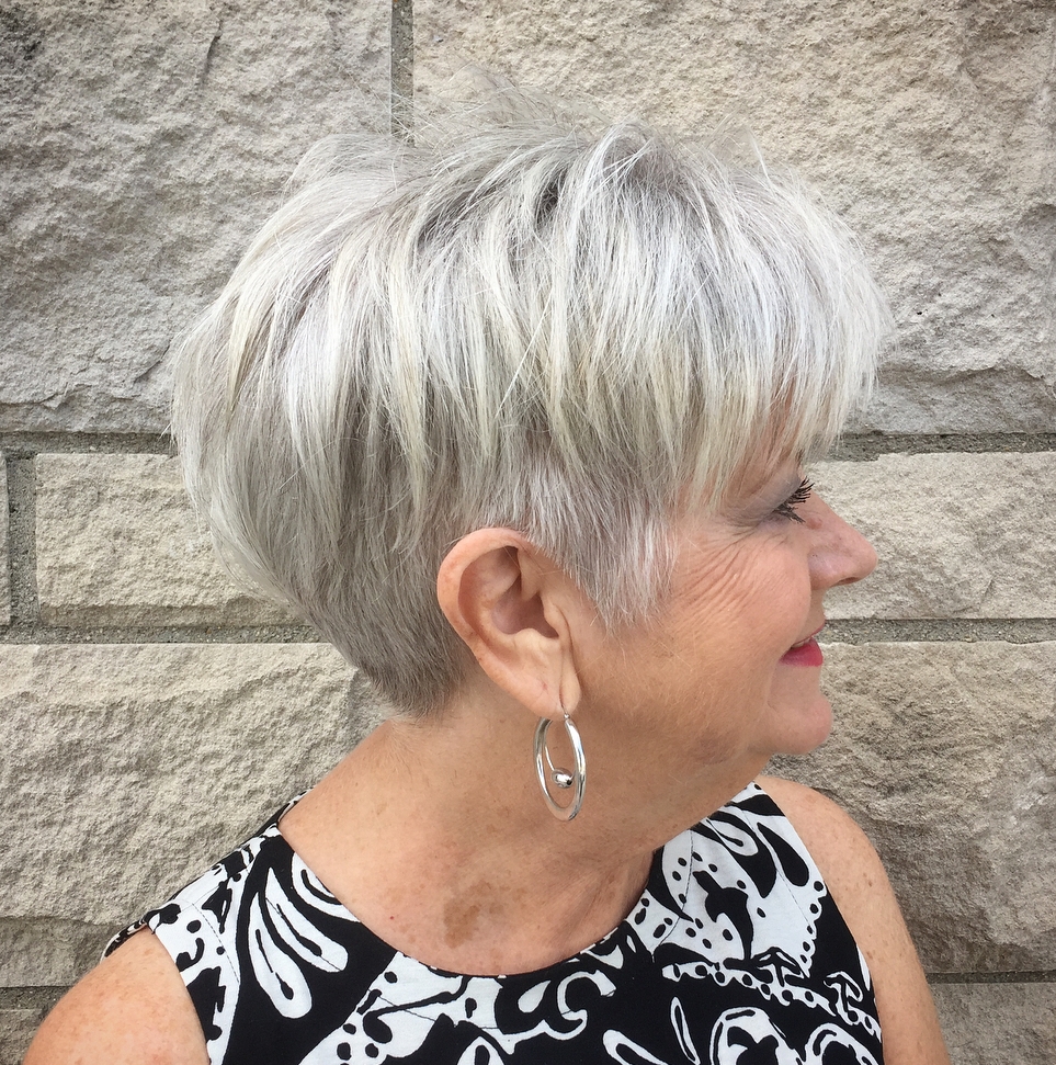 30 Best Short Hair For Older Women Over 60 With Glasses - 6. Bob with Bangs and Gray Blending Highlights