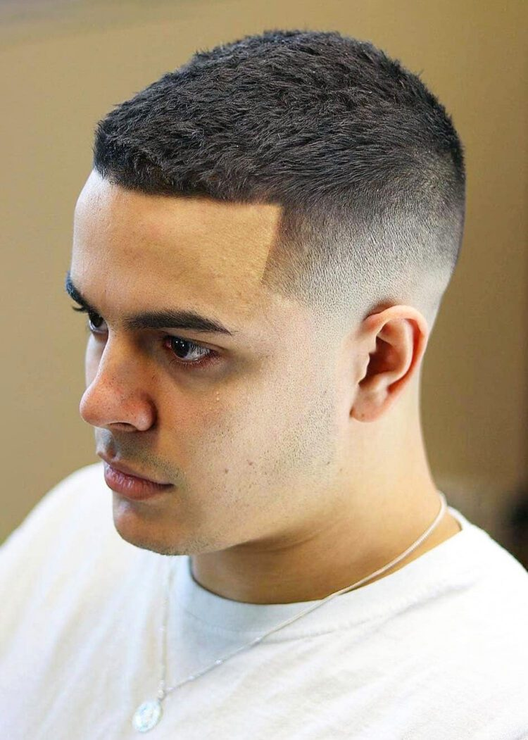 Side view of a guy wearing the iconic hairstyle 