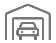 A car in a garage  Description automatically generated